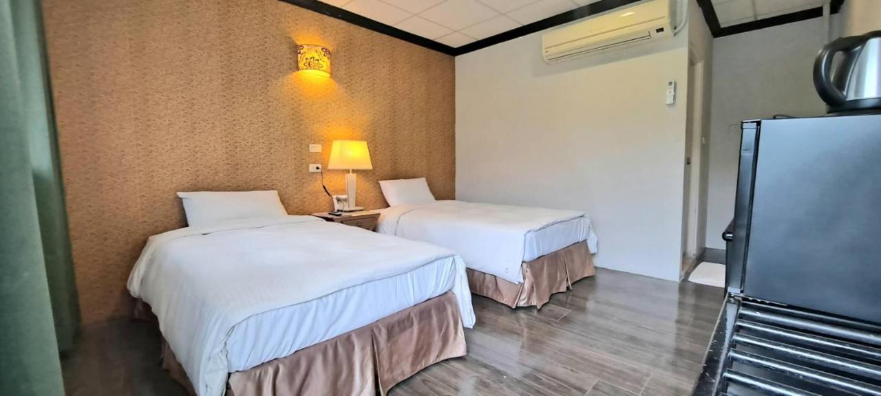 Jinhue Hotel Луйе Экстерьер фото