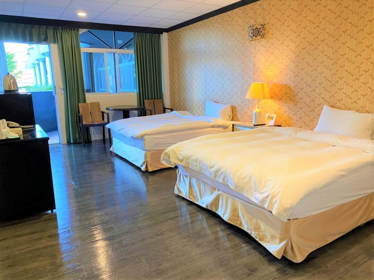 Jinhue Hotel Луйе Экстерьер фото