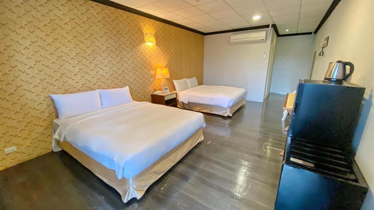 Jinhue Hotel Луйе Экстерьер фото