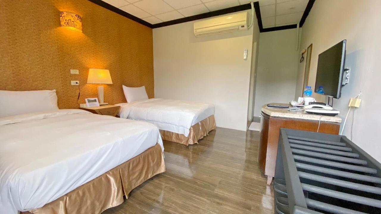 Jinhue Hotel Луйе Экстерьер фото